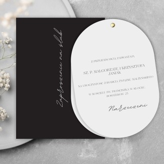 Zaproszenie ślubne minimalistyczne w białym kolorze z czarnym nadrukiem.