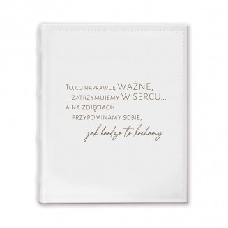 Album na zdjęcia wklejane z półpergaminem.