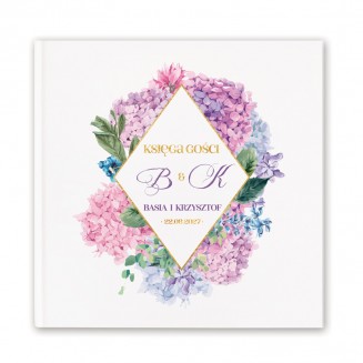 Personalizowana księga gości z imionami i datą na okładce.