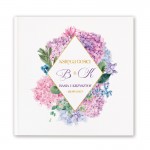 Personalizowana księga gości z imionami i datą na okładce.