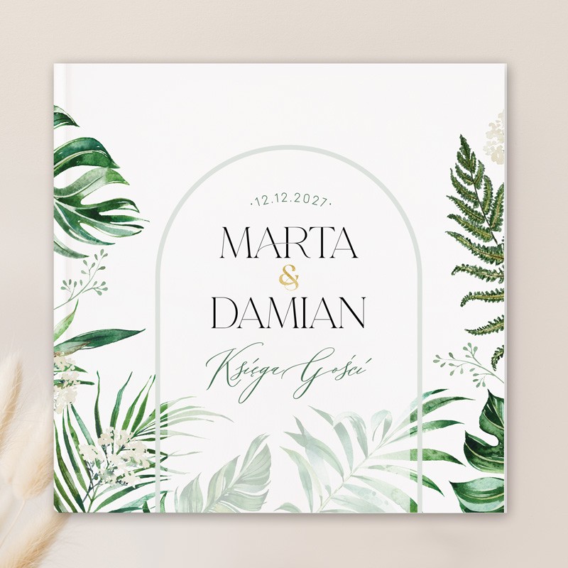 Księga na wpisy gości weselnych z imionami pary młodej i datą oraz zielonymi wzorami botanicznymi na okładce