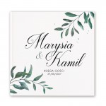 Personalizowana księga gości z zielonymi listkami i imionami Pary młodej na okładce.