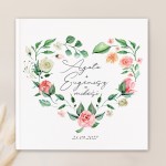 Personalizowana księga gości z kwiatowym sercem na okładce.