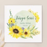 Księga gości z motywem słoneczników na okładce.