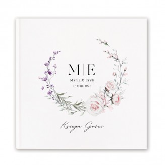 Personalizowana księga gości z motywem delikatnych kwiatów.