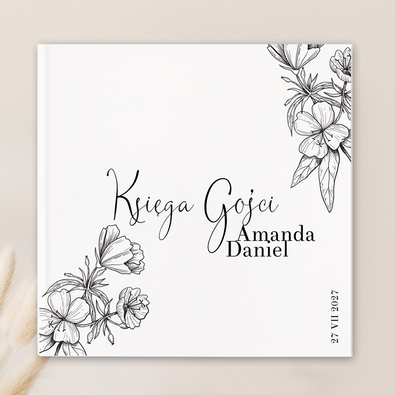Stylowa księga gości w biało-czarnej kolorystyce. Posiada delikatny kwiatowy motyw graficzny.