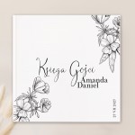 Stylowa księga gości w biało-czarnej kolorystyce. Posiada delikatny kwiatowy motyw graficzny.