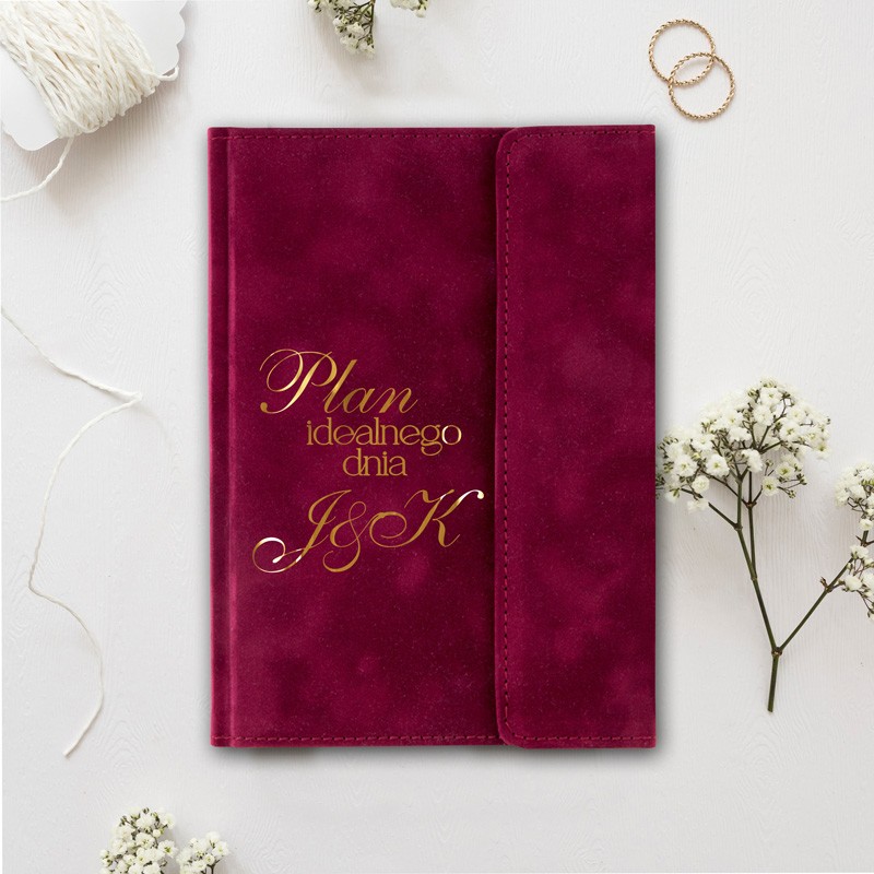 Elegancki notes welurowy w bordowym kolorze.