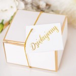 Bileciki białe ze złotym napisem dziękujemy.