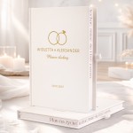 Personalizowany planer ślubny z grafiką obrączek.