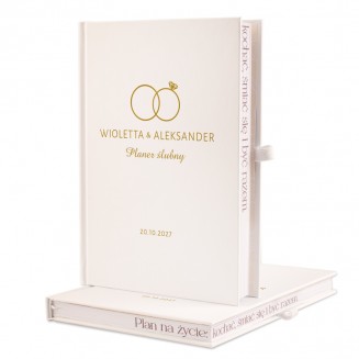 Planer ślubny z motywem obrączek.