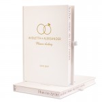 Planer ślubny z motywem obrączek.