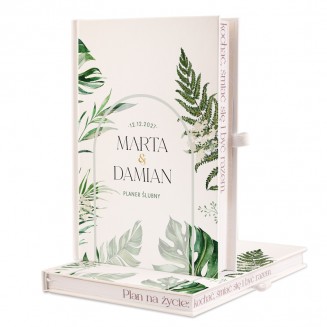 Planer ślubny z personalizowaną okładką i zielonym motywem graficznym.