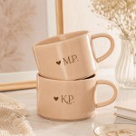 Eleganckie kubki beżowe z personalizacją.