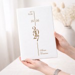 Personalizowana teczka na prezent ślubny z datą i imionami.